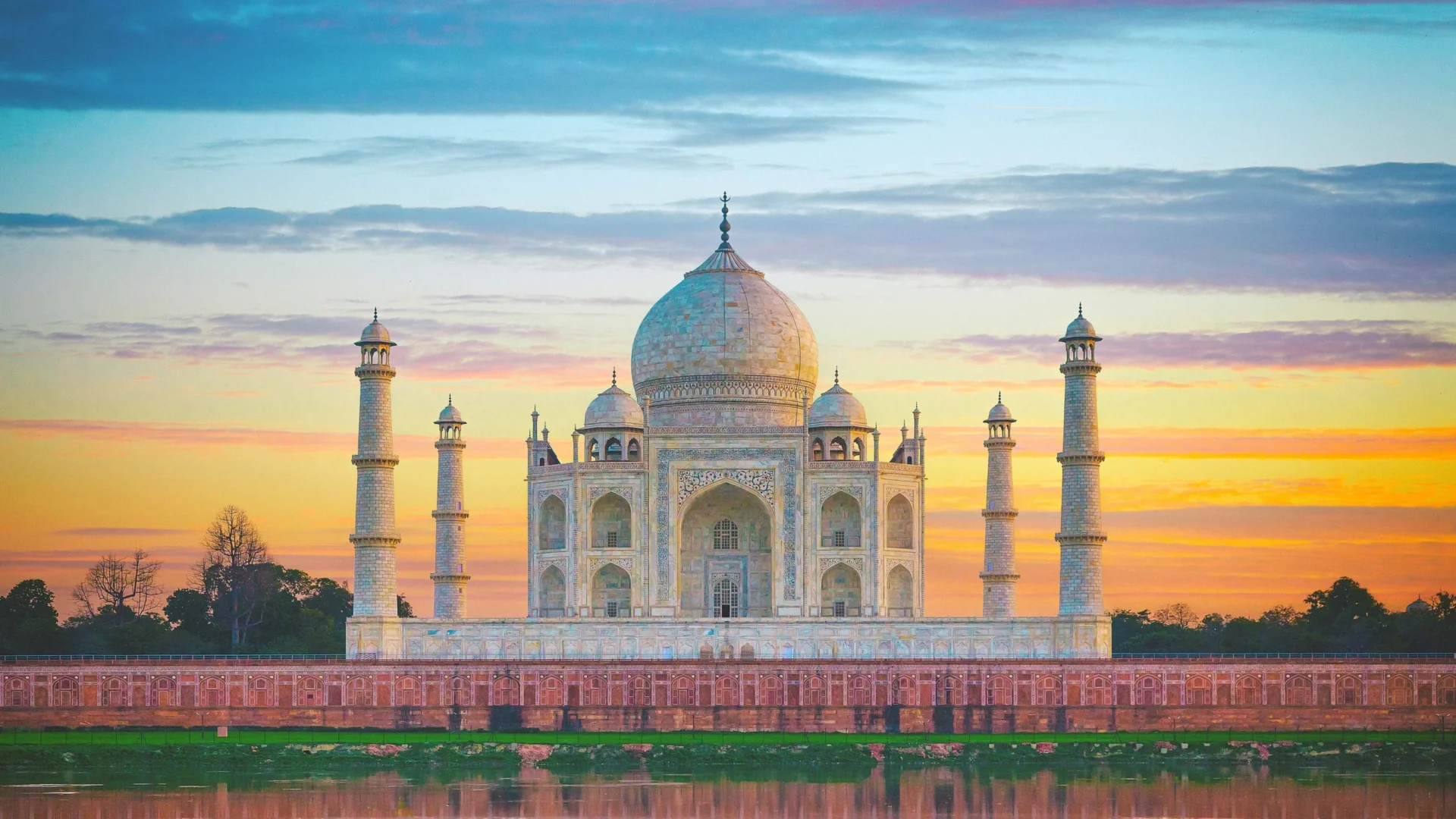 The Taj Mahal is the ultimate architectural tribute to eternal love. Its flawless white marble structure appears to glow and change color with the sun.- India tour Packages